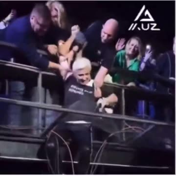 Saved by a man. Pushes him away.