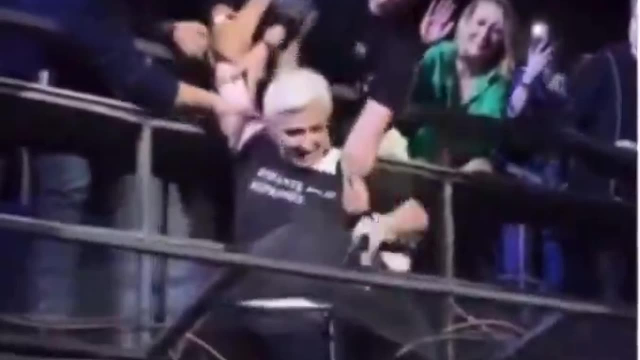 Saved by a man. Pushes him away.