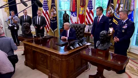 Trump plays down regime change in Venezuela amid military buildup