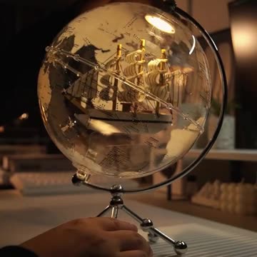 Illuminate your space with the stunning Golden Sail World Map