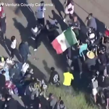 Anti-ICE protesters assault an adult male in civilian clothing in Southern California