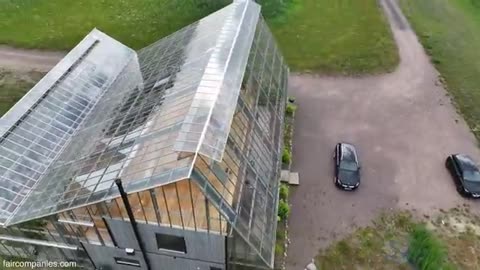 Family's self-built greenhouse home in farm country has indoor orchard 🌳