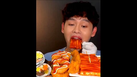 Spicy rice cake, fried chicken, fried shrimp rings, seaweed rice