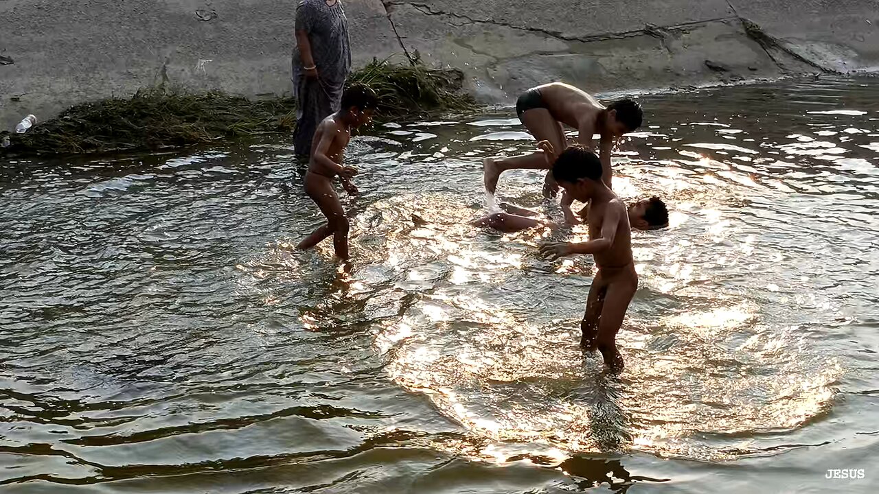 Small kid's are playing In the River