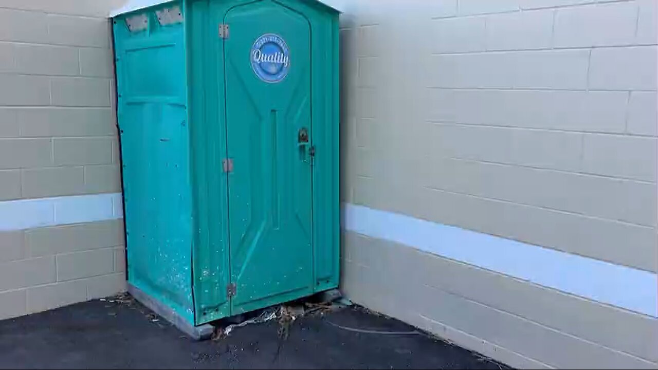 Green Porta-Potty