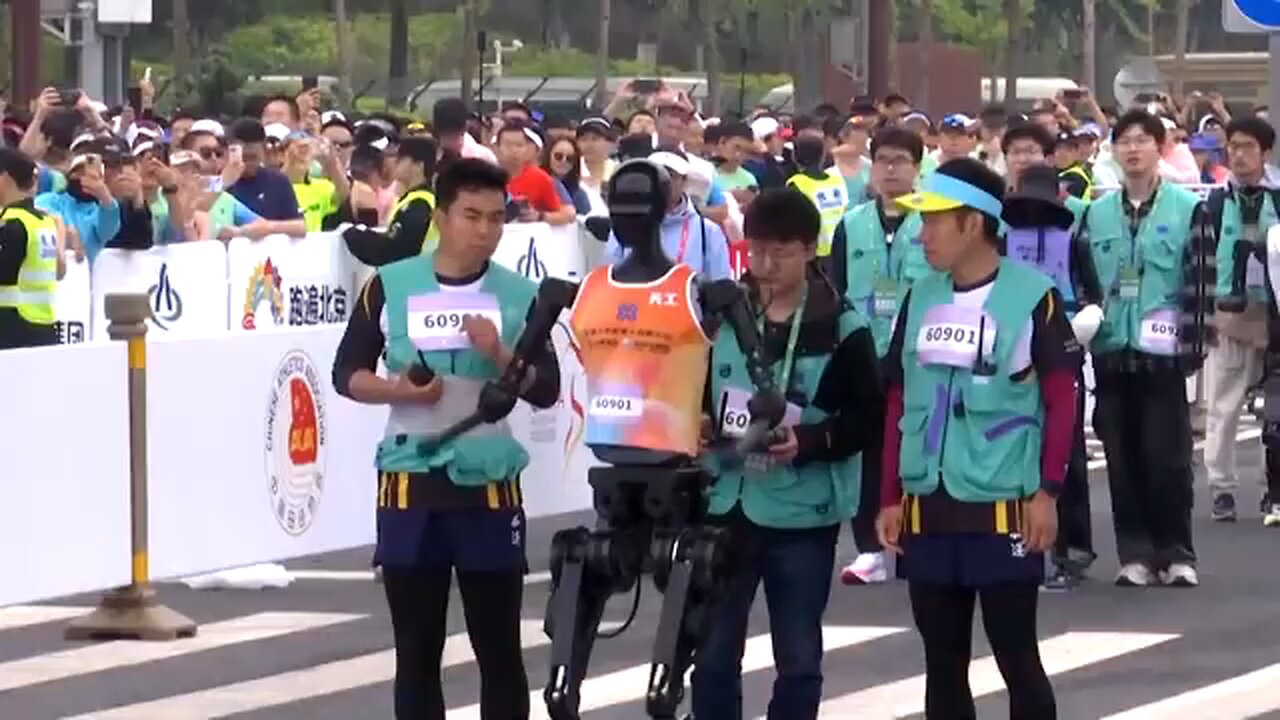 Humanoid robots race human in a half-marathon in Beijing