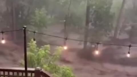 A whole house gets washed away down a river in New Mexico, due to intense rainfall or was it...