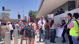 Protesters gathered outside the federal building in downtown Los Angeles, California