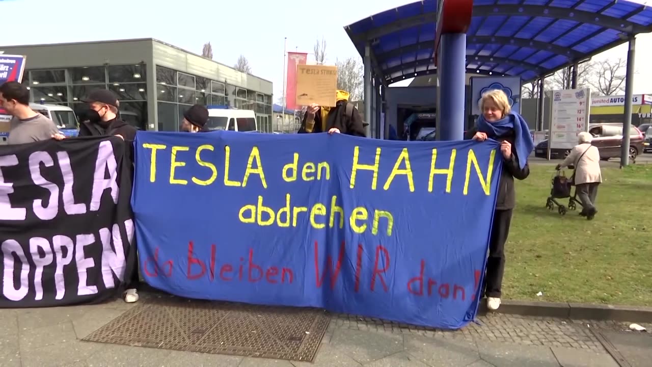 Protesters rally against Elon Musk at Berlin Tesla showroom