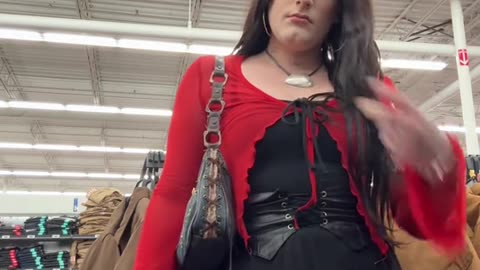 Goth tgirl alone in shopping