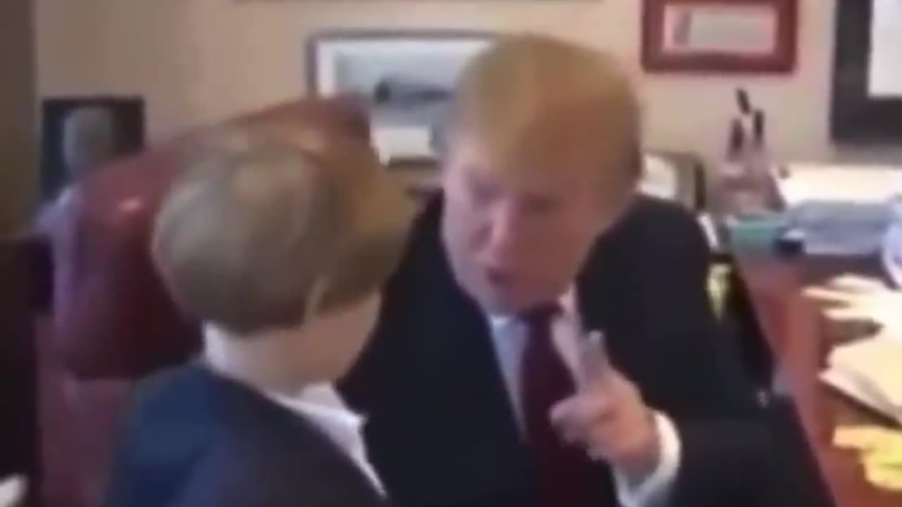 Donald Trump giving a young Barron Trump great advice
