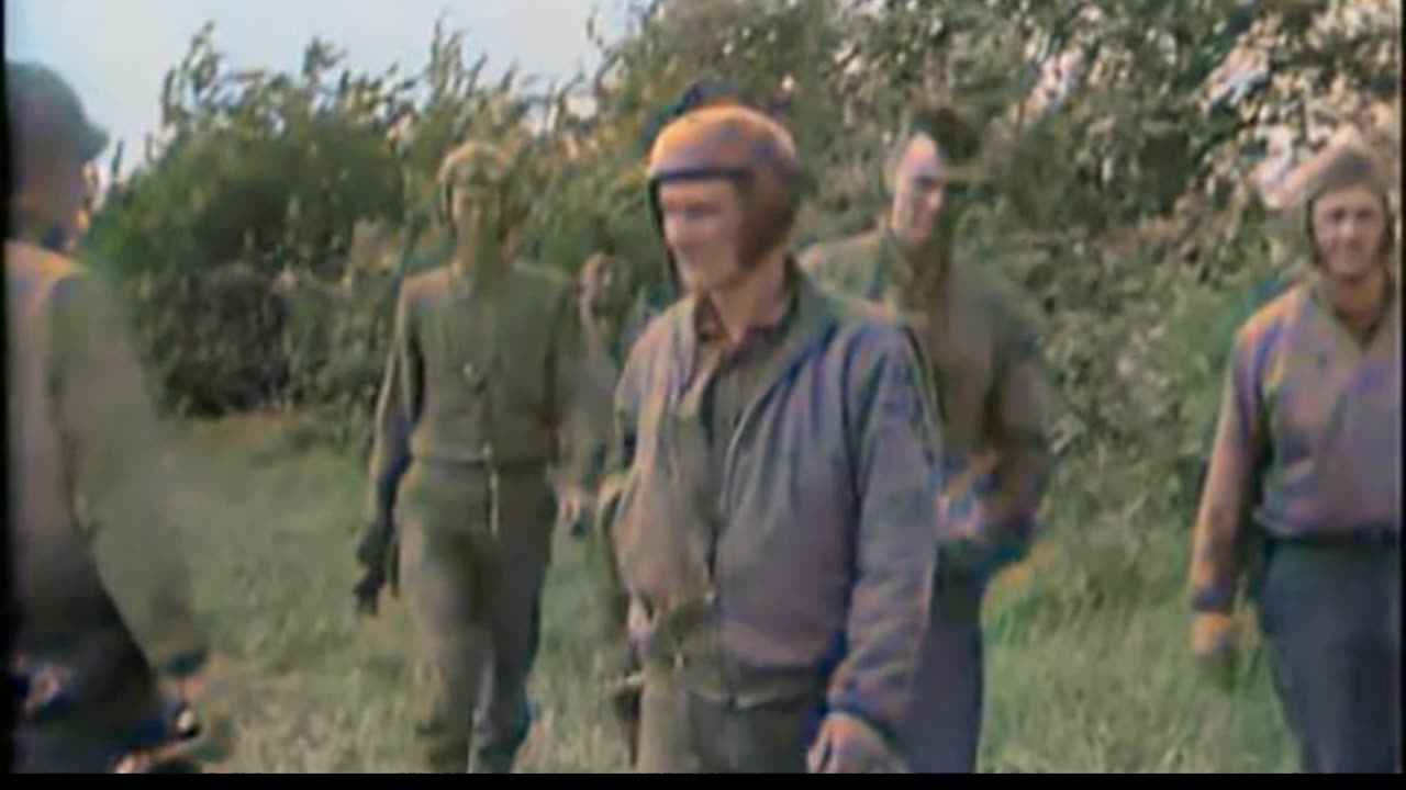 1944 Sherman crew returns on foot 🚶‍♂️ Tank burns in distance behind 🔥 #Colourized