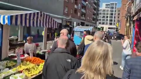 The Irish Prime Minister Michael Martin gets chased down the street by angry citizens