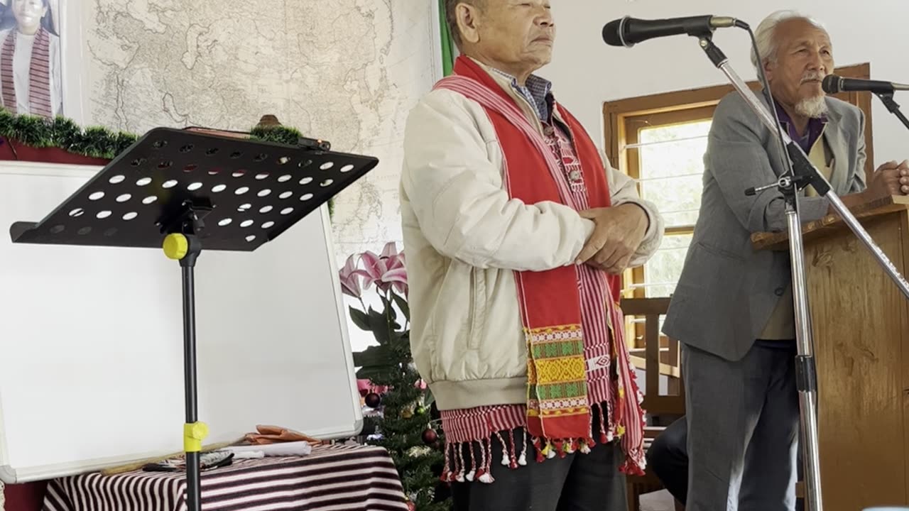 Longsing Bey singing a portion of the Moserah
