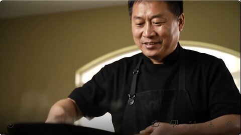 A Man Cooking Some Noodles