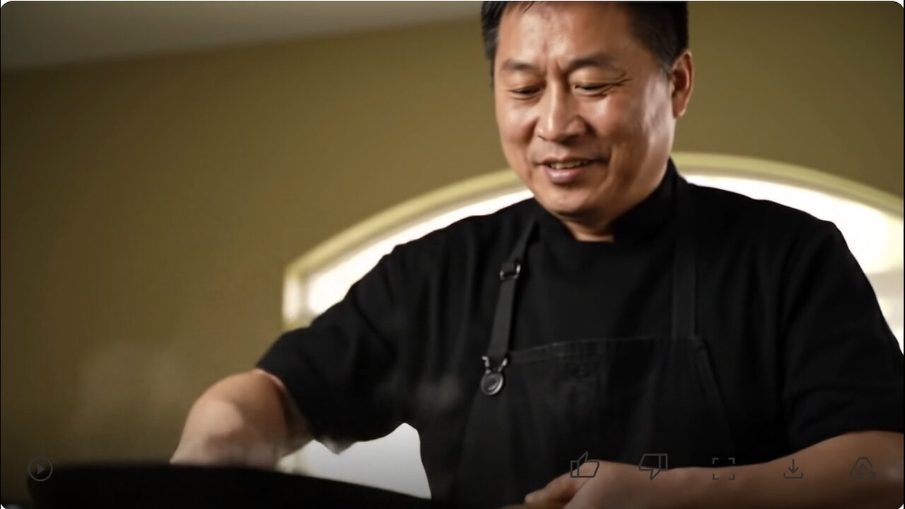 A Man Cooking Some Noodles