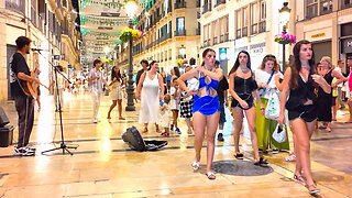 Nightlife on Larios Street with Street Music – Málaga in August, Spain