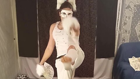 Male Dancer Waving Fans Around to Chill Vibes