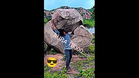 “Man vs Giant Stone 😂💪”