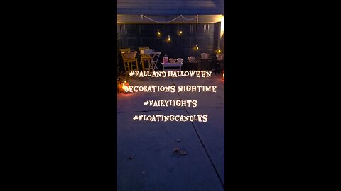 How our fall decorations look at night! Fall fairy lights and floating candles. Yes or no?