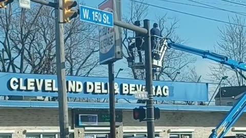 Commercial Sign Repair Workers at Cleveland Deli & Beverage
