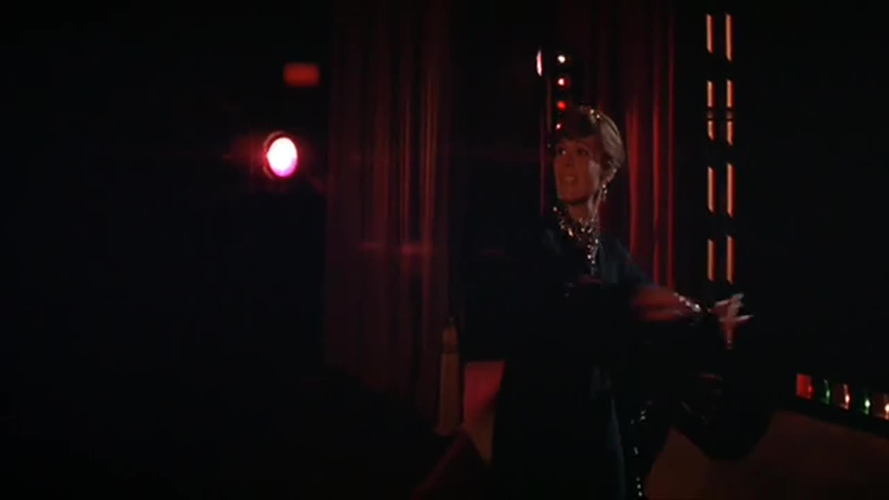 "Whistling Away the Dark" by Julie Andrews