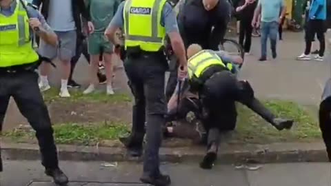 Irish locals clash with the police at an anti-migration protest