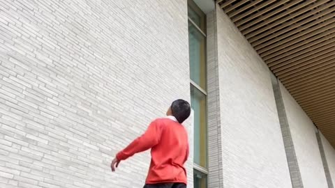 Soccer Player Kicks Ball Into Rafters