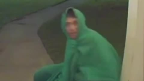 Creepy Guy Trespasses Private Residence, Lurks Around in Green Blanket
