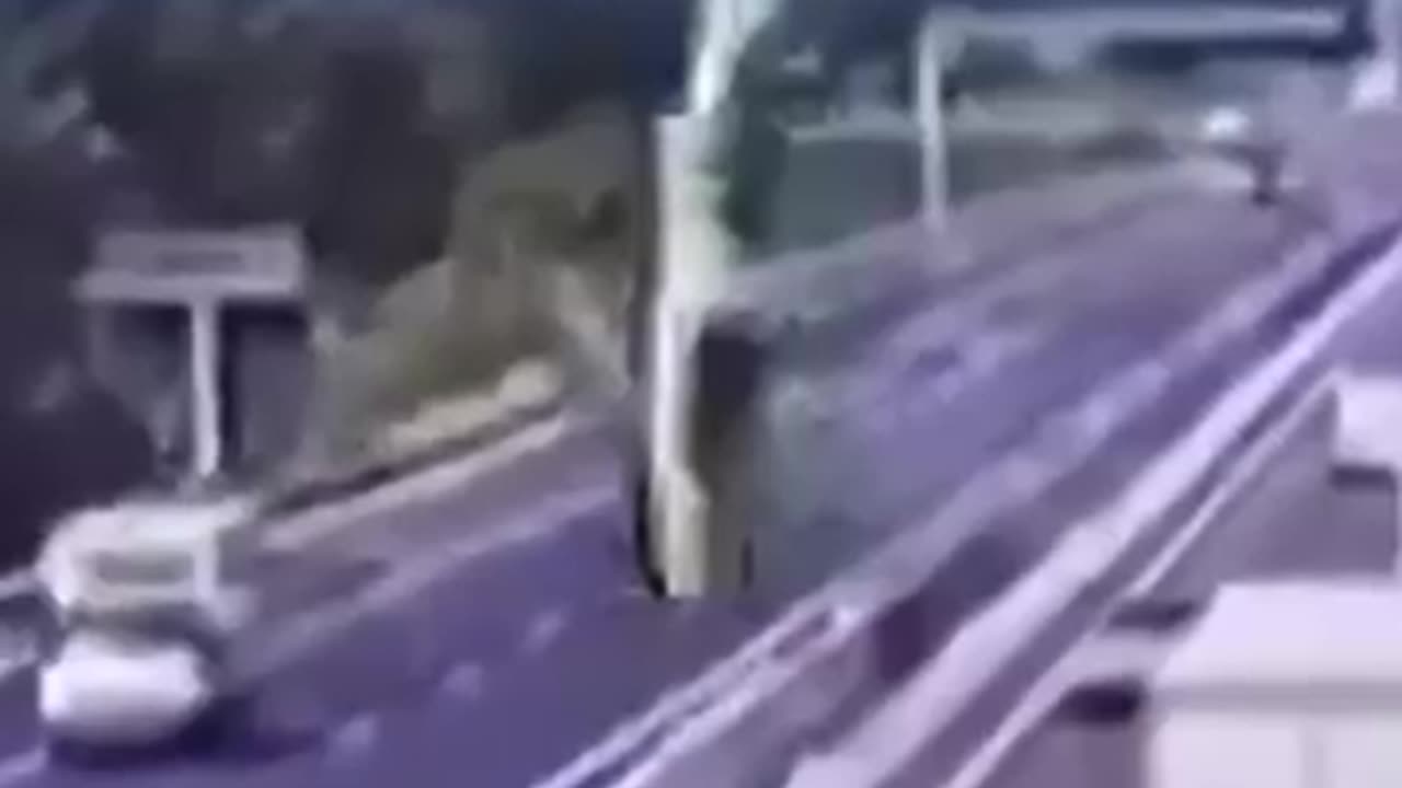 Shocking moment plane crashes into highway