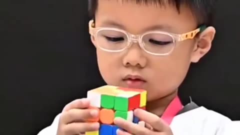 A 4-year-old kid has amazed viewers by solving a rubik's cube in under 20 seconds