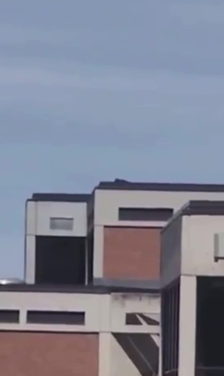 Suspect seen laying on roof before shooting Charlie Kirk