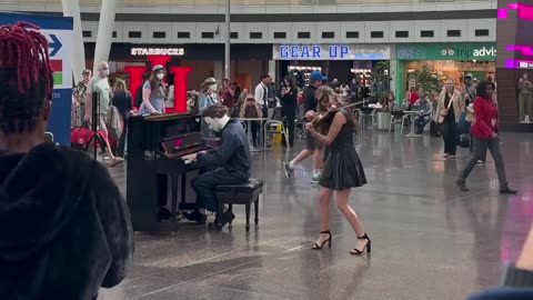 Michael Myers interrupted by Cat Woman at the airport. Shocked crowd_