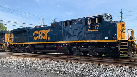 Newly Painted CSX Train 7107 and 7575 with friendly engineer