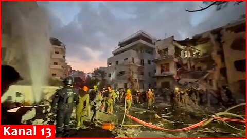 Buildings destroyed in central Israel following new wave of missiles launched from Iran