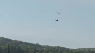 Man Hanging from Drone Crashes to Water Below