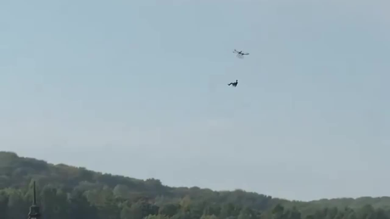 Man Hanging from Drone Crashes to Water Below