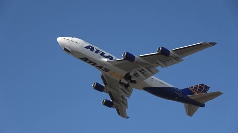 The Boeing 747-400F of Atlas Air literally plows the ground next to the runway during takeoff.