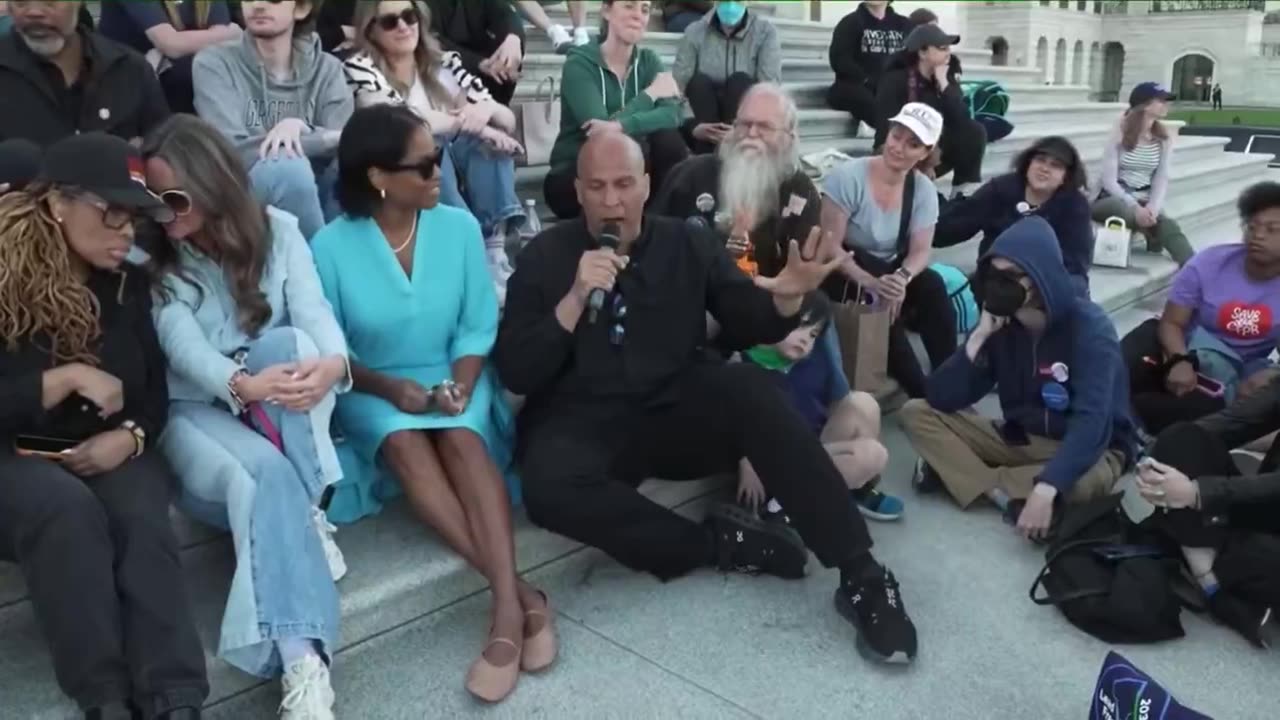 BOOKER: “I miss Obama. I miss her husband too.”