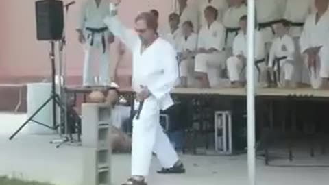 Coconut Break with Downward Palm Strike