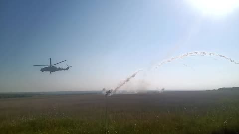 Ukrainian Mi24 Helicopters Firing Rockets into Russian Lines