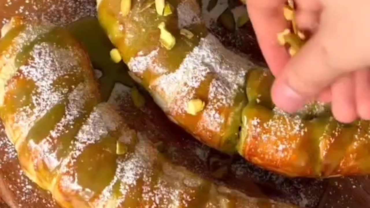 Snack for dessert, banana stuffed with pistachio wrapped with pastry dough