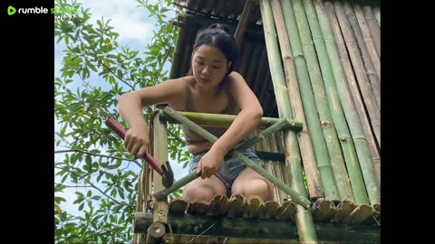 Camping alone in a bamboo house built on a tree in the jungle