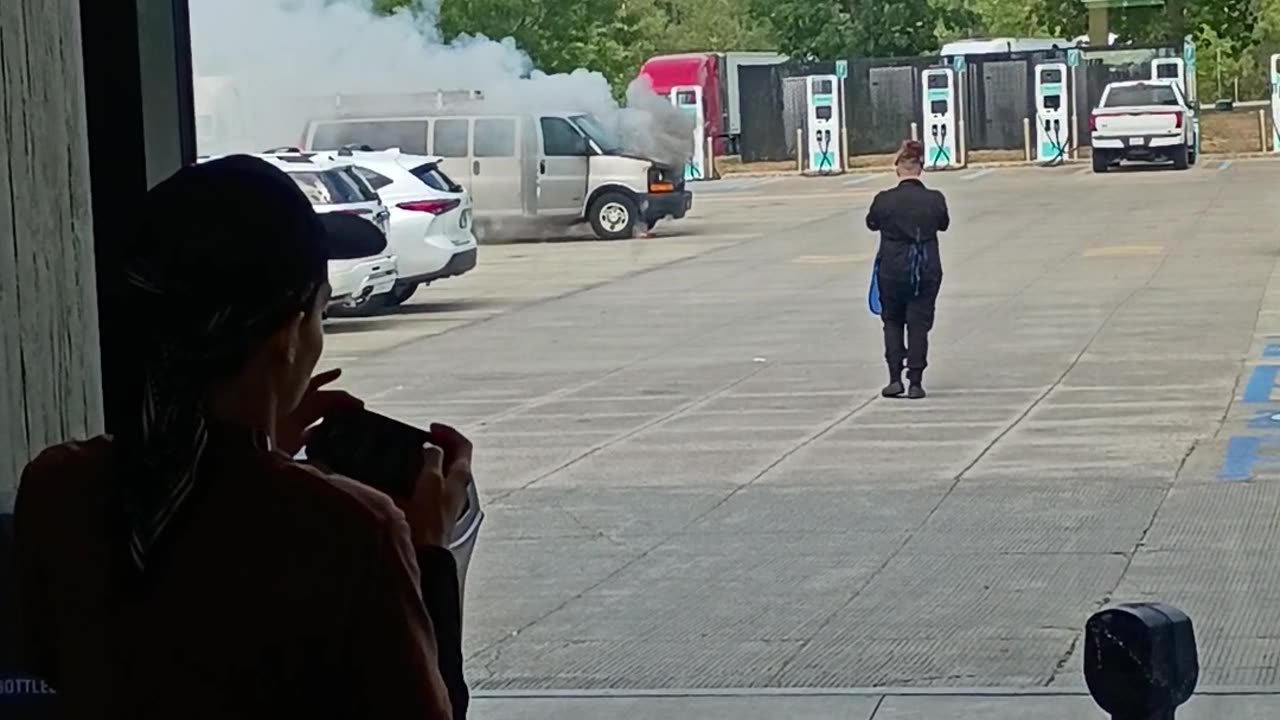 Massive van on fire on the highway. crazy fire