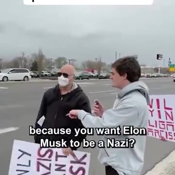 Tesla Protestors with signs calling Elon Musk a Nazi are interviewed and reveal they have a $35 million dollar grant with the NIH