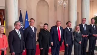 US President Donald J. Trump shows European leaders his Butler painting "Fight, Fight, Fight