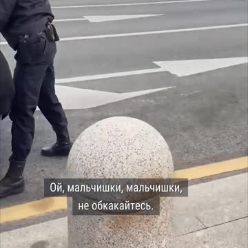 Russian Woman Violently Bundled into a Car for Holding a Sign in Protest