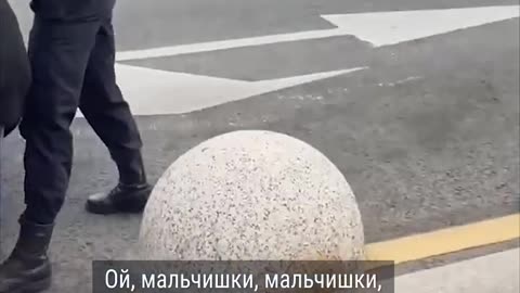 Russian Woman Violently Bundled into a Car for Holding a Sign in Protest