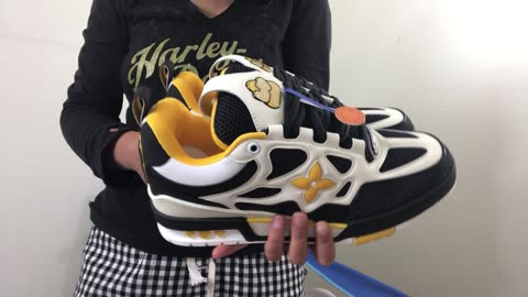 This is a pair FAKE Louis Vuitton shoes