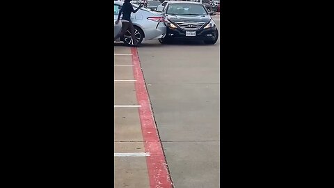 A woman accidentally hit a parked car while backing out. #Accident #Traffic #japd